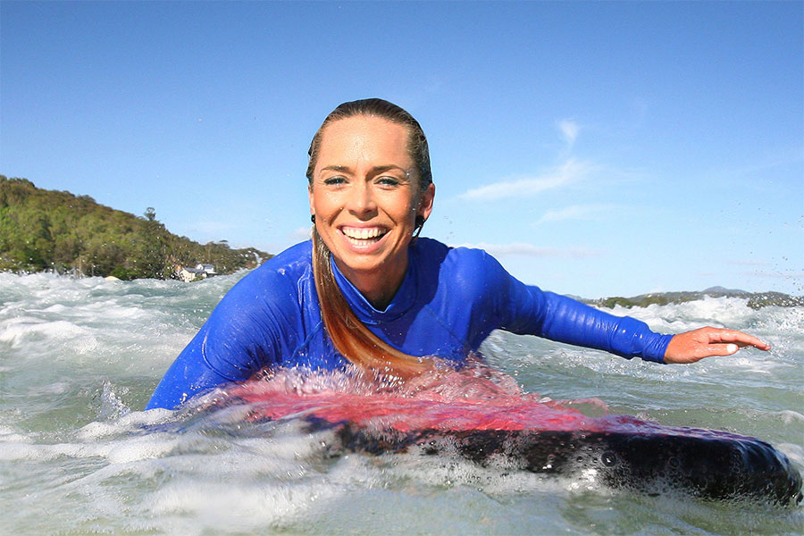 Ladies surfing – Learn to surf with Surfing Services