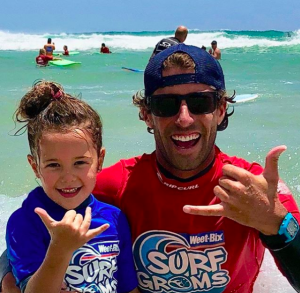Stoked grom and coach at Surfing Services Australia, Currumbin Alley